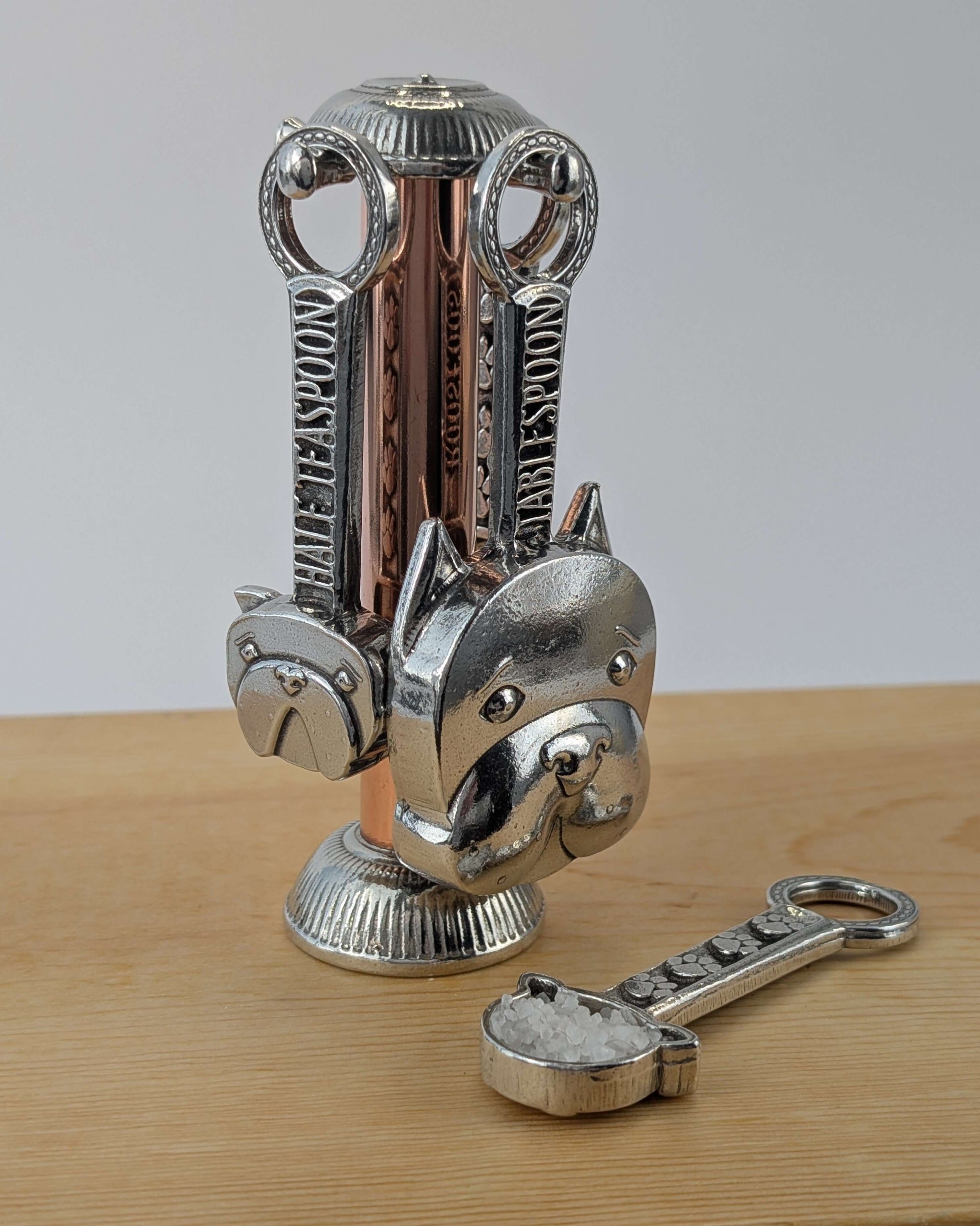 Pewter dog measuring spoons with  copper stand