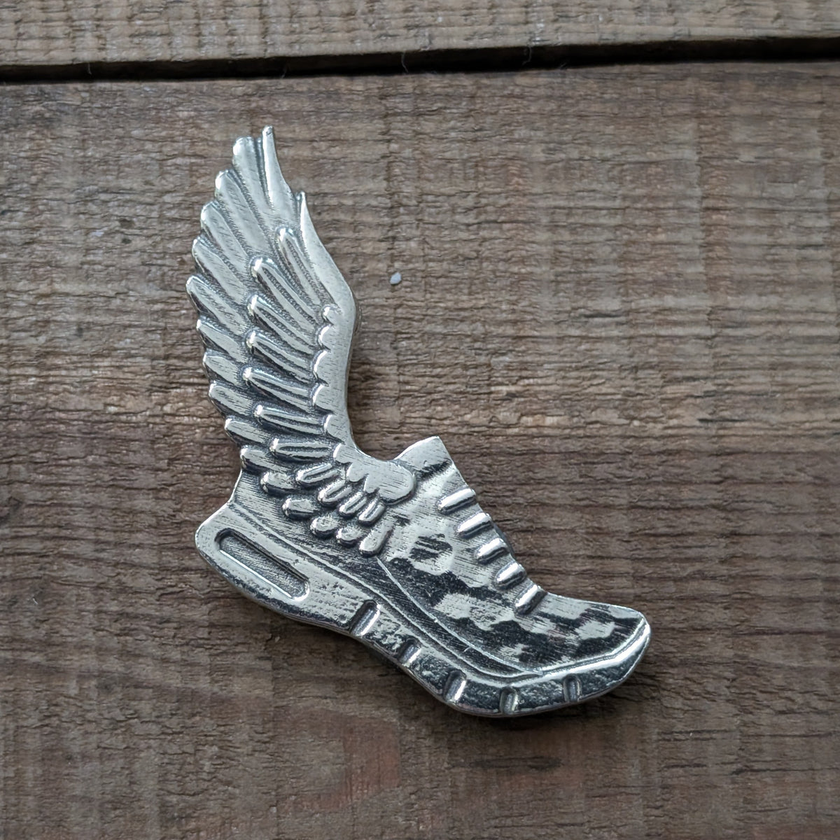 Winged Running Shoe Magnet – handmade pewter, made in Oregon