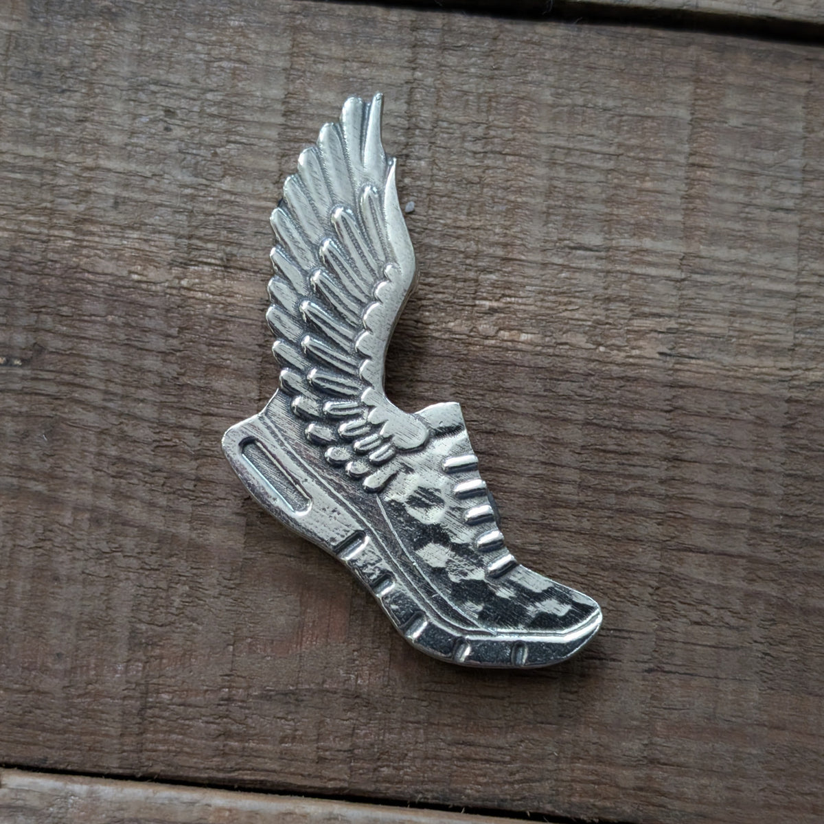 Winged Running Shoe Magnet – alternate view, handmade pewter
