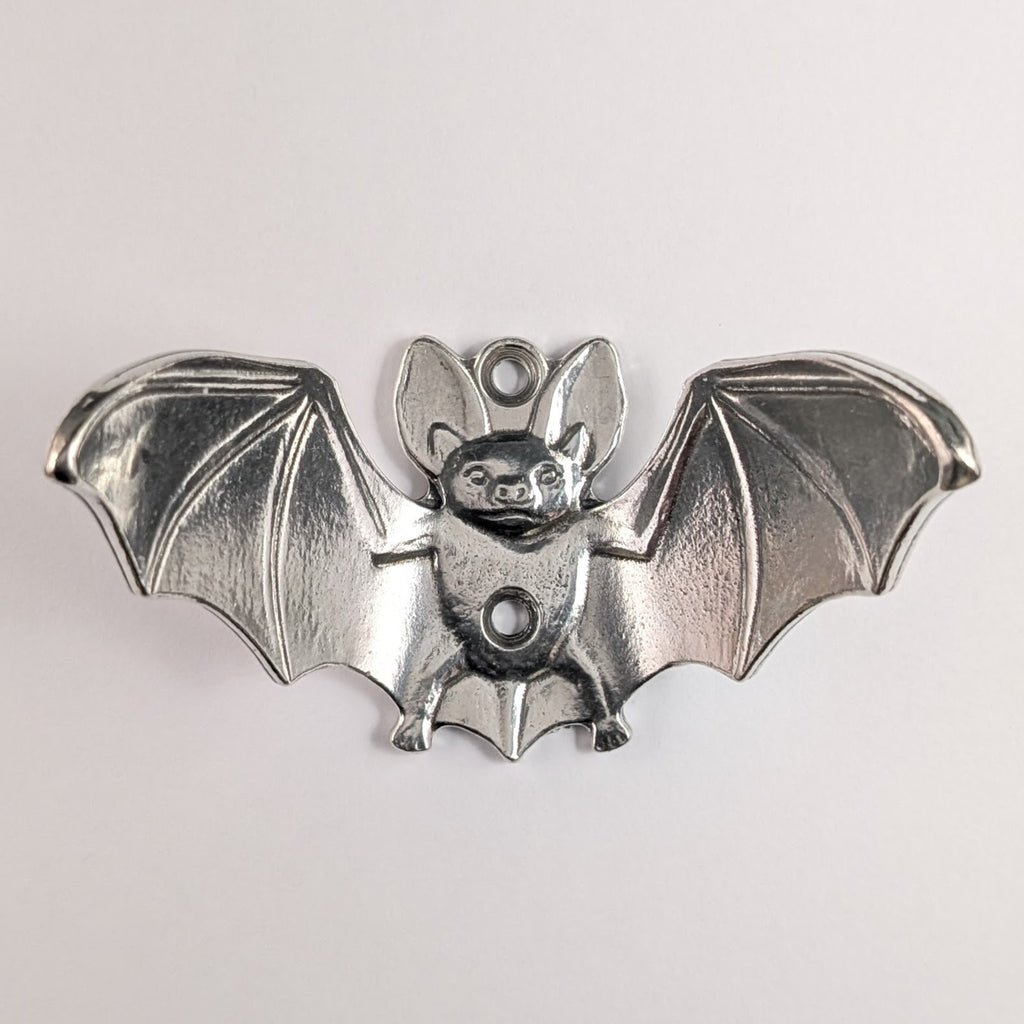 Pewter bat wall hook product photo on a white background, front view