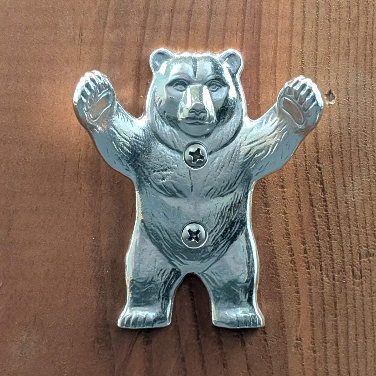 Pewter bear wall hook product photo on a white background, front view with arms raised